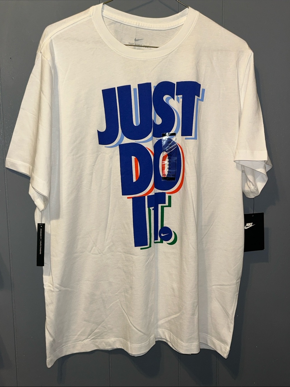 Nike White Short Sleeve Tee with Blue, Red & Green 'JUST DO IT' Graphic